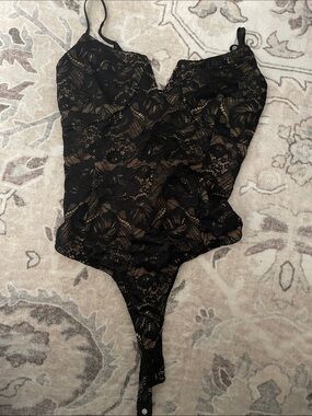 Lulu's Black Lace Bodysuit with Nude Lining